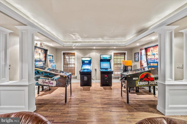 217 Rising Meadow Way E, Stroudsburg, PA 18302 - game room featuring decorative columns, wood finished floors, a tray ceiling, crown molding, and recessed lighting