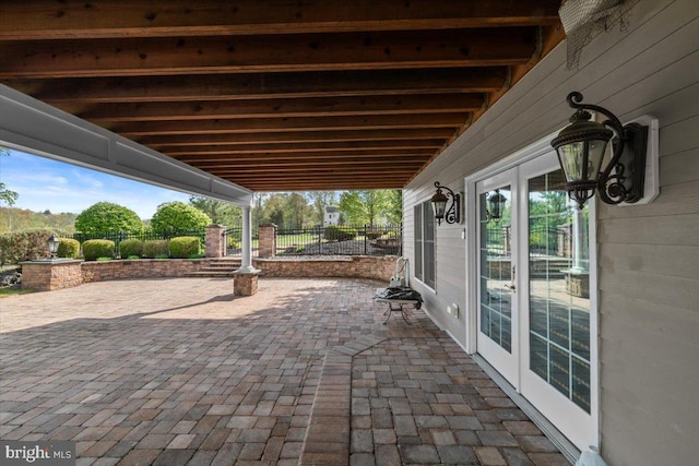 217 Rising Meadow Way E, Stroudsburg, PA 18302 - view of patio / terrace featuring french doors