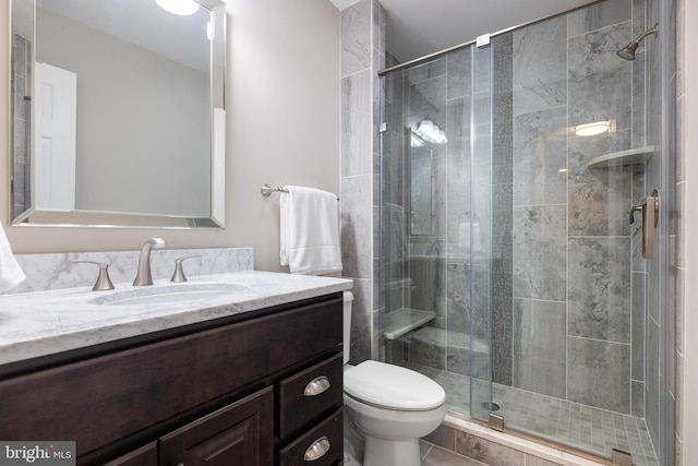 370 Juniper Ct, Herndon, VA 20170 - bathroom featuring toilet, a stall shower, and vanity