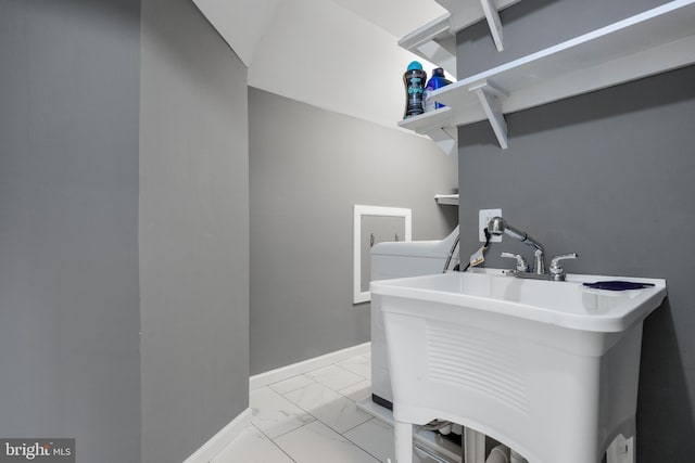 370 Juniper Ct, Herndon, VA 20170 - laundry room with light marble finish floors, washer hookup, and baseboards