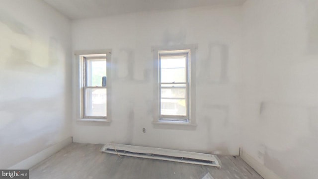 1500 Main St, Gilberton, PA 17934 - spare room featuring a baseboard radiator, wood finished floors, and baseboards