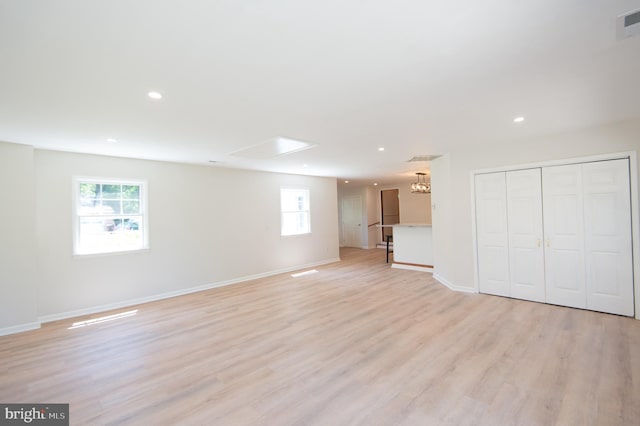 7 Hatsawap Rd, Cambridge, MD 21613 - unfurnished living room featuring healthy amount of natural light, light wood finished floors, baseboards, and recessed lighting