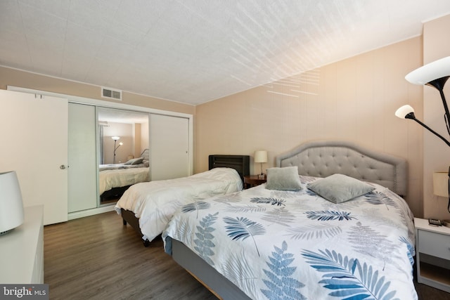 bedroom featuring wood finished floors