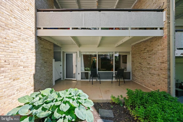 view of patio with a balcony