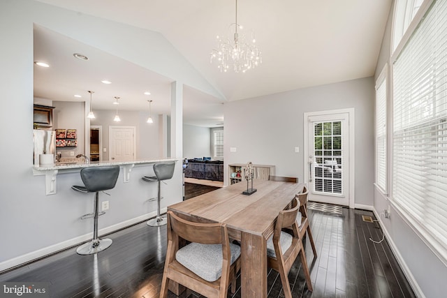 3104 Reach Eagle Ct, Woodbridge, VA 22191 - dining area with dark wood-style floors, baseboards, lofted ceiling, a chandelier, and recessed lighting