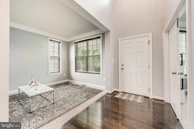 3104 Reach Eagle Ct, Woodbridge, VA 22191 - entrance foyer with crown molding, dark wood finished floors, and baseboards
