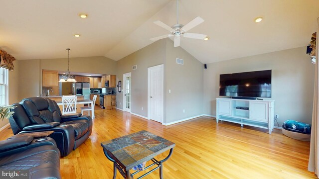 38 Ward Ave, Audubon, NJ 08106 - living room featuring light wood-type flooring, vaulted ceiling, a ceiling fan, baseboards, and recessed lighting