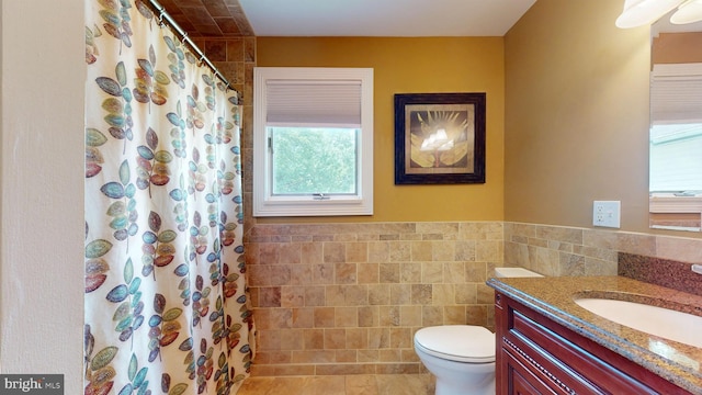 38 Ward Ave, Audubon, NJ 08106 - full bathroom with tile walls, toilet, vanity, wainscoting, and a shower with curtain