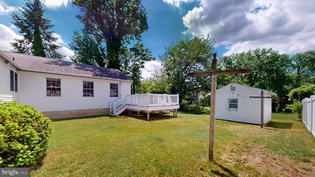 38 Ward Ave, Audubon, NJ 08106 - view of yard featuring a wooden deck and an outbuilding