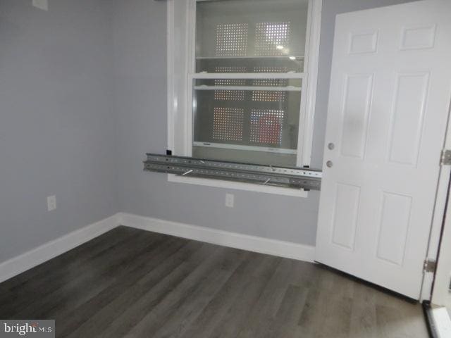 2413 Nicholas St, Philadelphia, PA 19121 - spare room featuring baseboards and wood finished floors