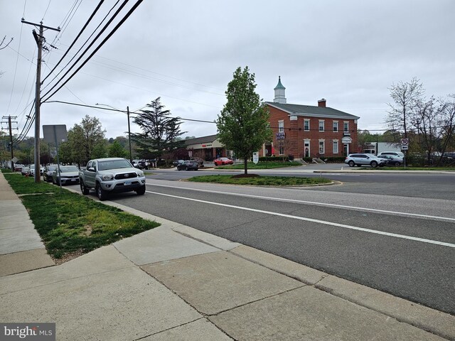 1413 Belle View Blvd Unit C1, Alexandria, VA 22307 - view of asphalt street with sidewalks, street lights, curbs, and traffic signs