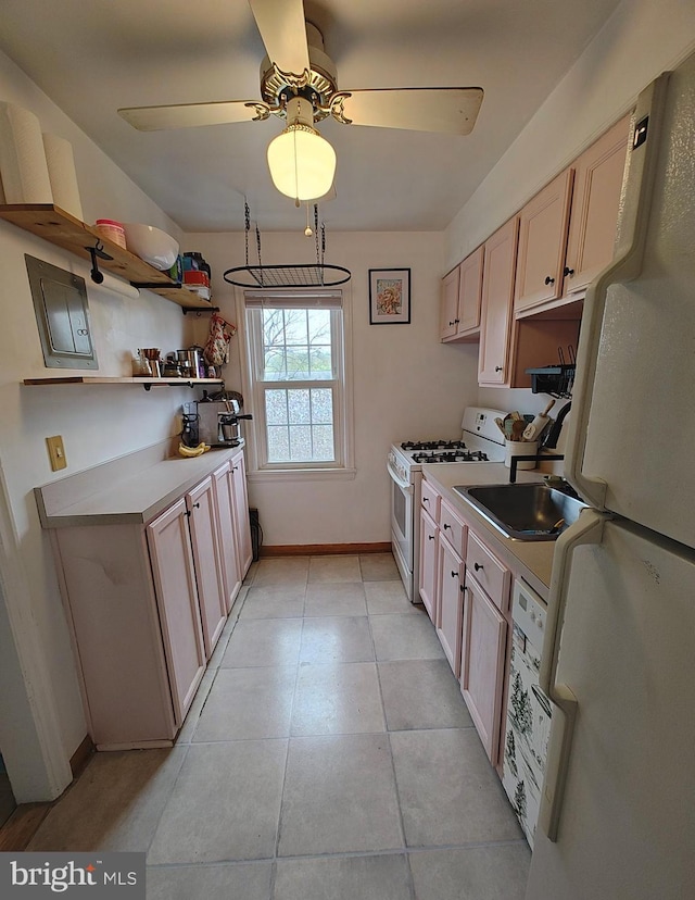 1413 Belle View Blvd Unit C1, Alexandria, VA 22307 - kitchen with white appliances, a ceiling fan, light countertops, a sink, and light tile patterned flooring