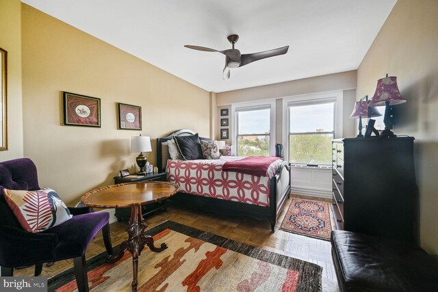bedroom featuring vaulted ceiling and ceiling fan