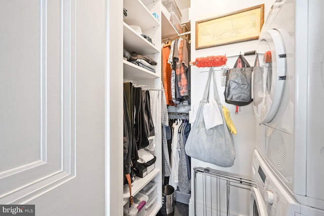 spacious closet with stacked washer / dryer