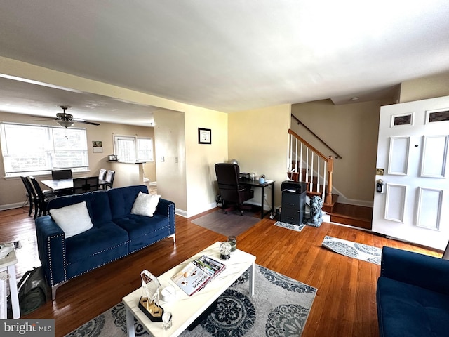 912 Evesham Ave, Baltimore, MD 21212 - living area featuring ceiling fan, stairs, wood finished floors, and baseboards