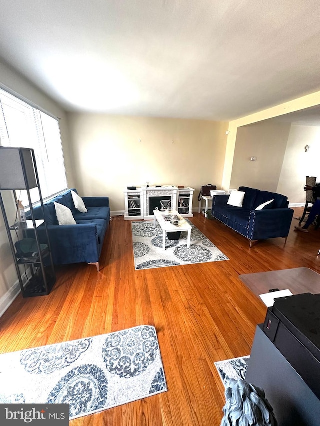 912 Evesham Ave, Baltimore, MD 21212 - living room featuring wood finished floors and baseboards