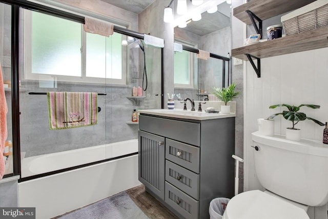 400 Hill Cir, Reading, PA 19607 - bathroom featuring vanity, toilet, and shower / bath combination with glass door
