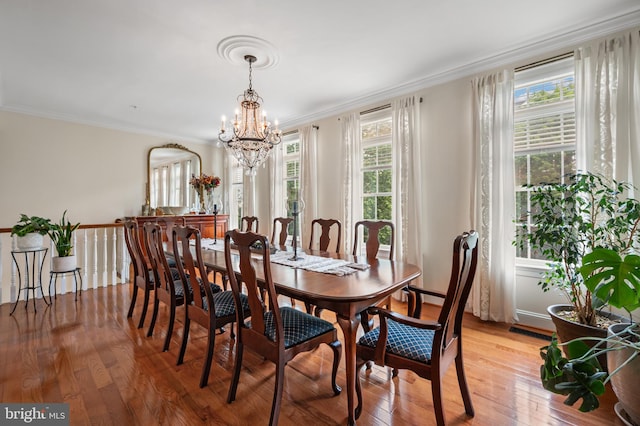 7311 Trappe St, Fulton, MD 20759 - dining room with a chandelier, light wood finished floors, and crown molding