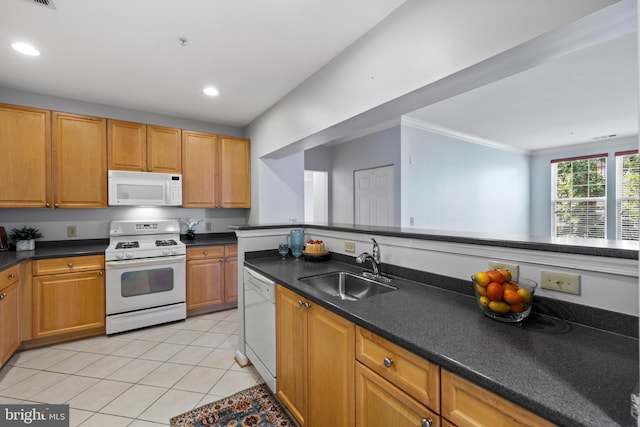 4950 Brenman Park Dr Unit 301, Alexandria, VA 22304 - kitchen featuring white appliances, a sink, light tile patterned flooring, dark countertops, and recessed lighting