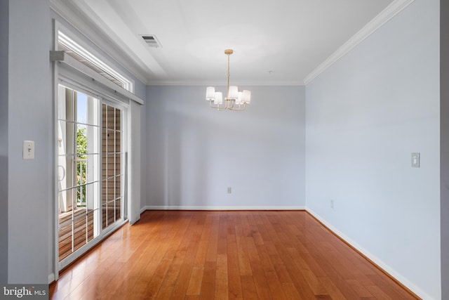 4950 Brenman Park Dr Unit 301, Alexandria, VA 22304 - empty room with a chandelier, light wood-style floors, baseboards, and crown molding