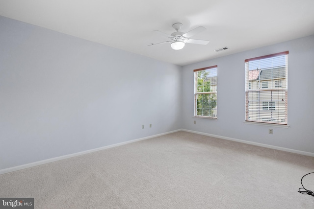 4950 Brenman Park Dr Unit 301, Alexandria, VA 22304 - spare room with light carpet, ceiling fan, and baseboards