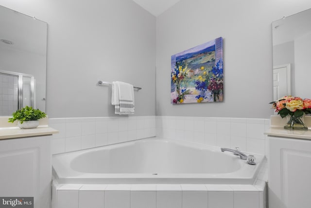 4950 Brenman Park Dr Unit 301, Alexandria, VA 22304 - full bathroom featuring vanity, a bath, and a stall shower
