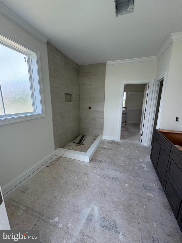 26171 Millman Dr, Hebron, MD 21830 - bathroom featuring ornamental molding, a tile shower, and baseboards