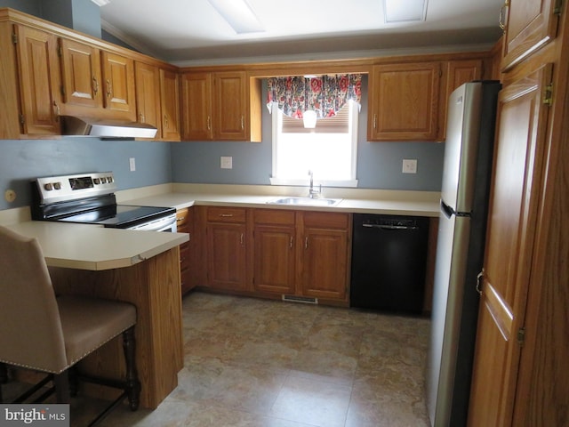 538 Haventree Ct, New Hope, PA 18938 - kitchen with under cabinet range hood, a sink, range with electric cooktop, black dishwasher, and freestanding refrigerator
