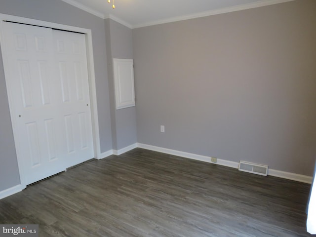 538 Haventree Ct, New Hope, PA 18938 - unfurnished bedroom with dark wood-style flooring, ornamental molding, baseboards, and a closet