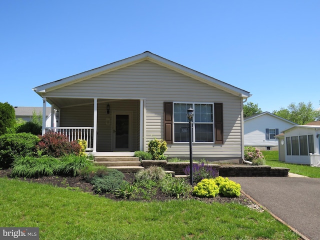 538 Haventree Ct, New Hope, PA 18938 - view of front of property with covered porch and a front yard