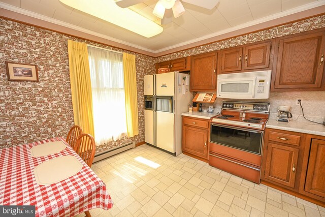 206-208 N 10th St, Oakland, MD 21550 - kitchen with white appliances, baseboard heating, light countertops, brown cabinets, and ornamental molding