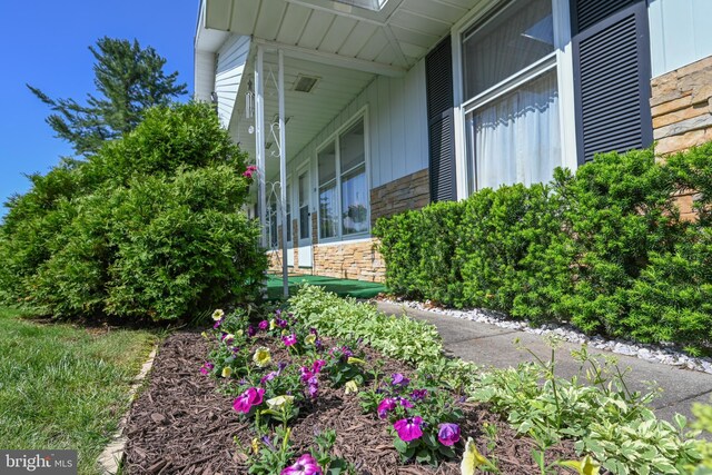 206-208 N 10th St, Oakland, MD 21550 - view of side of home with stone siding and board and batten siding