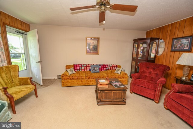 206-208 N 10th St, Oakland, MD 21550 - living room featuring carpet floors, wood walls, and ceiling fan