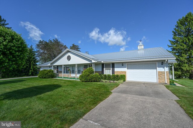 206-208 N 10th St, Oakland, MD 21550 - ranch-style home featuring an attached garage, a front lawn, stone siding, concrete driveway, and metal roof