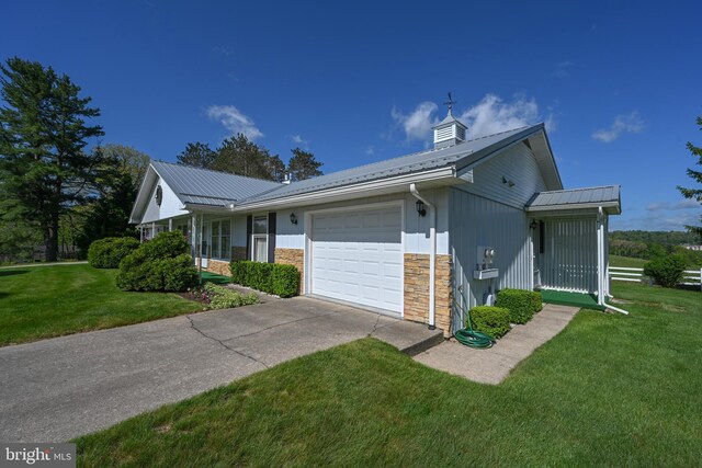 206-208 N 10th St, Oakland, MD 21550 - ranch-style house with an attached garage, metal roof, a front yard, and concrete driveway