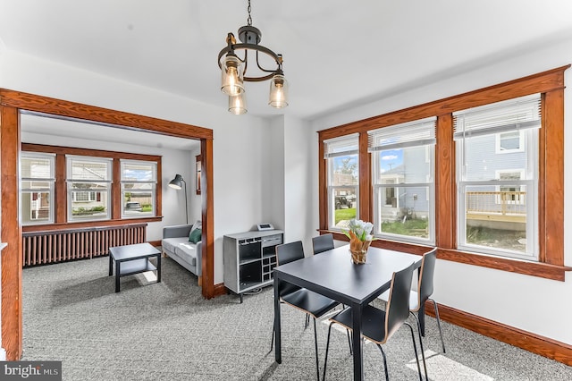 1112 Randall Ave, Upper Chichester, PA 19061 - carpeted dining area featuring baseboards and a chandelier