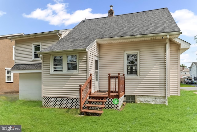 1112 Randall Ave, Upper Chichester, PA 19061 - rear view of property with roof with shingles, a lawn, and an attached garage