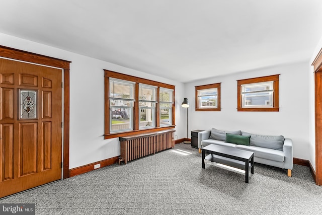 1112 Randall Ave, Upper Chichester, PA 19061 - carpeted living room featuring baseboards and radiator heating unit