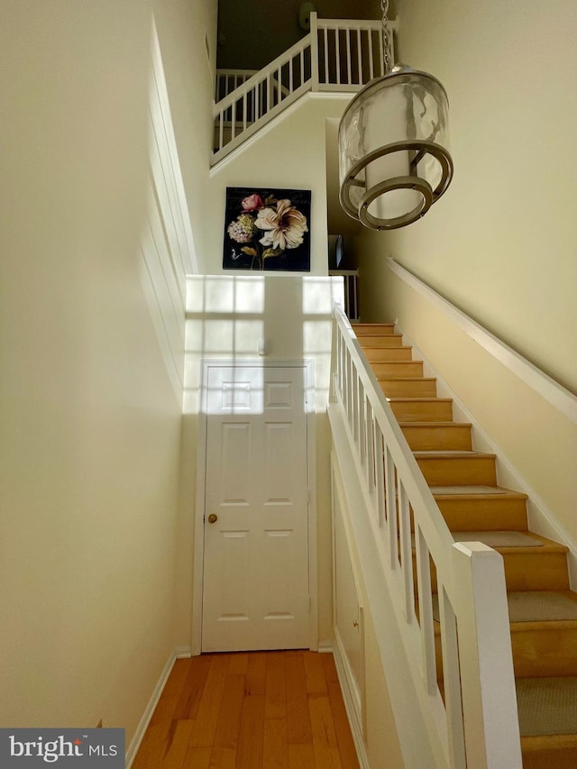 1369 Garden Wall Cir Unit 714, Reston, VA 20194 - stairs featuring wood finished floors and baseboards