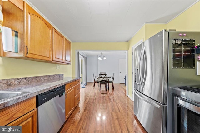 3 High Ridge Rd, Pemberton, NJ 08068 - kitchen featuring stainless steel appliances, light wood-type flooring, and brown cabinets