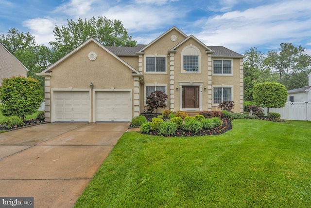 view of front of home with concrete driveway, an attached garage, and stucco siding