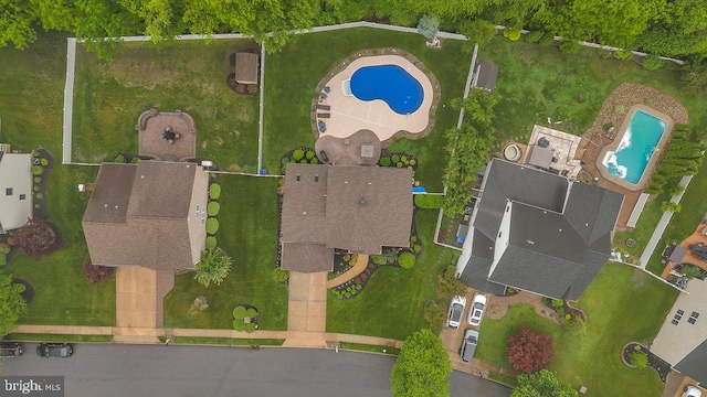 aerial overview of property's location with a pool