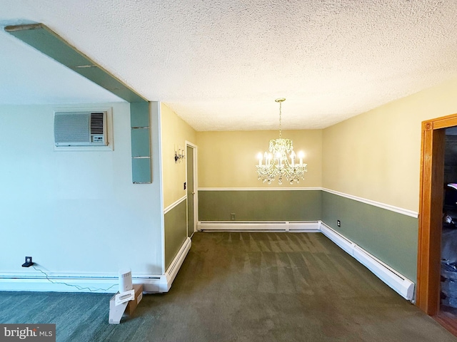 unfurnished dining area featuring carpet floors, a wall mounted air conditioner, a chandelier, a textured ceiling, and a baseboard radiator