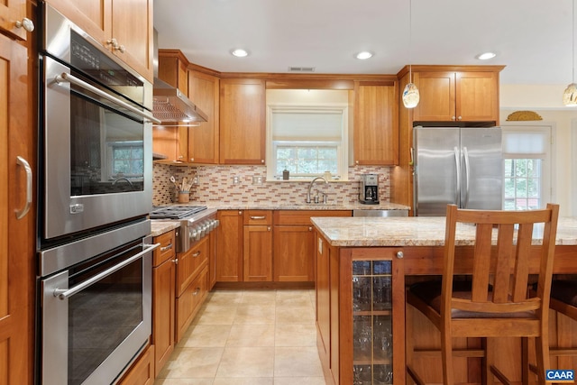 2657 Coralberry Pl, Charlottesville, VA 22911 - kitchen featuring stainless steel appliances, a sink, plenty of natural light, decorative backsplash, and recessed lighting