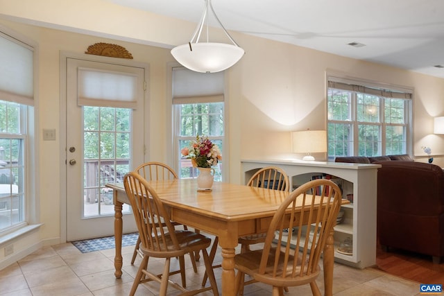 2657 Coralberry Pl, Charlottesville, VA 22911 - dining area with healthy amount of natural light and light tile patterned floors