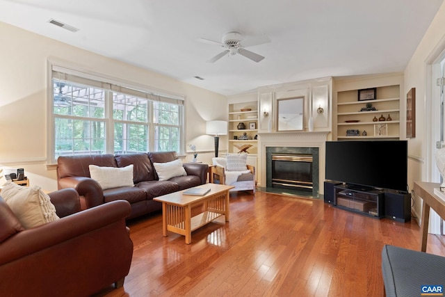 2657 Coralberry Pl, Charlottesville, VA 22911 - living room with ceiling fan, wood finished floors, and a fireplace