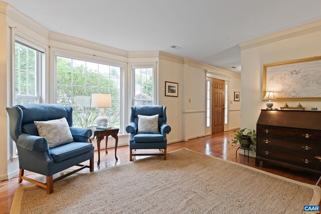 2657 Coralberry Pl, Charlottesville, VA 22911 - sitting room featuring wood finished floors, crown molding, and baseboards