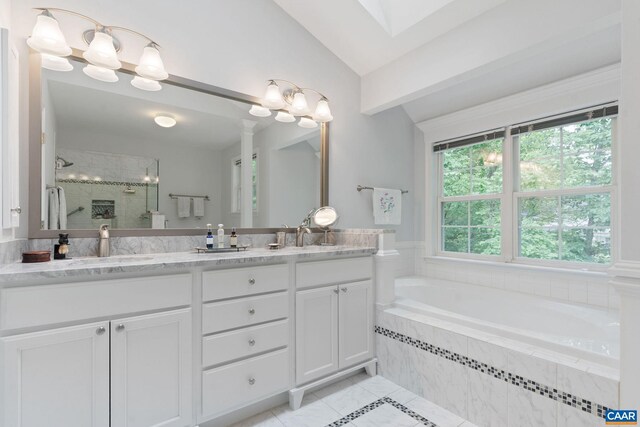 2657 Coralberry Pl, Charlottesville, VA 22911 - bathroom with tile patterned floors, a shower stall, lofted ceiling, double vanity, and a bath