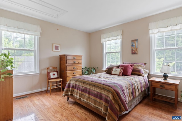 2657 Coralberry Pl, Charlottesville, VA 22911 - bedroom featuring attic access, light wood finished floors, multiple windows, and baseboards