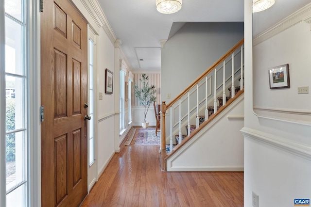 2657 Coralberry Pl, Charlottesville, VA 22911 - entryway with wood finished floors, stairs, and ornamental molding